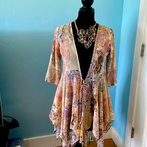 Beautiful flutter bottom tie front blouse- new!  size small Anthropologie